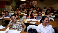 Filipino workers, including nurses applying to work in United Kingdom, attend a lecture at a review center for the International English Language Testing System or IELTS in Manila, Philippines, April 2, 2019. Picture taken April 2, 2019. REUTERS/Eloisa Lo