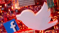 FILE PHOTO: 3D printed Facebook and twitter logos are placed on a computer motherboard in this illustration taken January 21, 2021. REUTERS/Dado Ruvic/Illustration/File Photo
