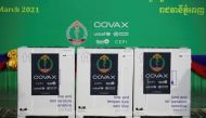Containers of Oxford/AstraZeneca vaccines are pictured during a handover ceremony as the country receives its coronavirus disease (COVID-19) vaccines under COVAX scheme at the Phnom Penh International Airport, Cambodia, March 2, 2021. REUTERS/Cindy Liu