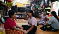 Family members of Sithu, 37, who was killed during a raid by security forces mourn at their home in Thaketa, Yangon, Myanmar March 13, 2021. Reuters/Stringer