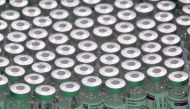 Empty vials of Oxford/AstraZeneca's COVID-19 vaccine are seen at a vaccination centre in Antwerp, Belgium March 18, 2021. REUTERS/Yves Herman/File Photo