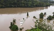 A view of orange orchards and houses that are submerged, as the state of New South Wales experiences widespread flooding and severe weather, near Hawkesbury River in northwestern Sydney, Australia, March 23, 2021. Picture taken with a drone. REUTERS/Jill 