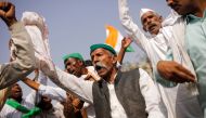 Farmers dance as they sing a folk song during a 12-hour strike, as part of protests against farm laws, on a highway at the Delhi-Uttar Pradesh border in Ghaziabad, India, March 26, 2021. REUTERS/Adnan Abidi
