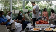 Residents sit in a waiting area after getting a commercial dose of Russia's Sputnik V coronavirus disease (COVID-19) vaccine, at a private hospital in Karachi, Pakistan April 4, 2021. REUTERS/Akhtar Soomro
