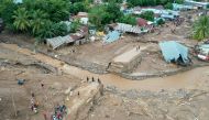An aerial picture shows damaged roads affected by flash floods after heavy rains in East Flores, East Nusa Tenggara province, Indonesia April 6, 2021, in this photo taken by Antara Foto/Aditya Pradana Putra/via Reuters.