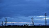 A factory and electricity pylons are seen from Sheerness, on the Isle of Sheppey, Britain, March 5, 2021. RUTERS/Dylan Martinez/File Photo