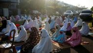 File photo of Indonesian Muslim women praying to celebrate Eid al-Fitr, at a residential area amid the spread of coronavirus disease (COVID-19) outbreak in Bekasi, on the outskirts of Jakarta, Indonesia, May 24, 2020. Reuters/Willy Kurniawan/File Photo
