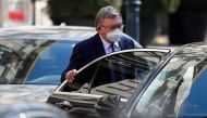 Russia's Governor to the International Atomic Energy Agency (IAEA), Mikhail Ulyanov, leaves at a meeting of the JCPOA Joint Commission, in Vienna, Austria, April 9, 2021. REUTERS/Leonhard Foeger