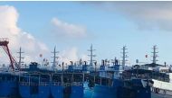 File photo: Chinese vessels, believed to be manned by Chinese maritime militia personnel, are seen at Whitsun Reef, South China Sea on March 27, 2021. Philippine Coast Guard/National Task Force-West Philippine Sea/Handout via Reuters