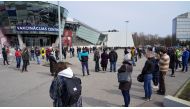 People queue up outside a mass vaccination centre as Latvia opens walk in coronavirus disease (COVID-19) vaccination scheme in Riga, Latvia, April 16, 2021. REUTERS/Janis Laizans?