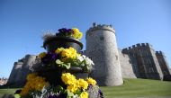 Flowers are pictured outside Windsor Castle on the day of the funeral of Britain's Prince Philip, husband of Queen Elizabeth, who died at the age of 99, in Windsor, near London, Britain April 17, 2021. REUTERS/Peter Cziborra