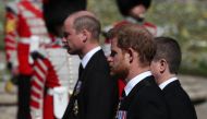 Britain's Prince Harry, Duke of Sussex and Britain's Prince William, Duke of Cambridge, look on during the funeral of Britain's Prince Philip, husband of Queen Elizabeth, who died at the age of 99, in Windsor, Britain, on April 17, 2021. (REUTERS)