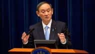 FILE PHOTO: Japanese Prime Minister Yoshihide Suga speaks during a news conference in Tokyo, Japan March 5, 2021. Yuichi Yamazaki/Pool via REUTERS//File Photo
