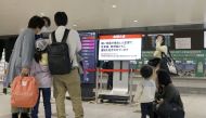 People gather around a ticket gate as train services are suspended following an earthquake in Sendai, Miyagi prefecture, Japan in this photo taken by Kyodo on May 1, 2021. Kyodo/via Reuters