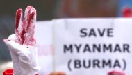 A protester flashes a three-finger salute during a march to protest against Myanmar military coup, in Taipei, Taiwan, May 2, 2021. Reuters/Ann Wang