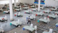 Beds are seen inside a Gurudwara (Sikh Temple) converted into a coronavirus disease (COVID-19) care facility amidst the spread of the COVID-19 in New Delhi, India May 5, 2021. REUTERS/Adnan Abidi