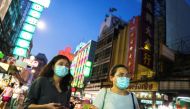 FILE PHOTO: People wearing face masks shop for street food in Chinatown amid the spread of the coronavirus disease (COVID-19) in Bangkok, Thailand, January 6, 2021. REUTERS/Athit Perawongmetha