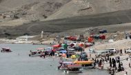 People gather during an excursion at a dam in Sayyan near Sanaa, Yemen May 16, 2021. Picture taken May 16, 2021. REUTERS/Khaled Abdullah
