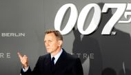 FILE PHOTO: Actor Daniel Craig poses for photographers on the red carpet at the German premiere of the new James Bond 007 film 