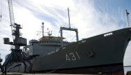 File photo: Iranian Kharg warship is pictured at a dock in the Syrian coastal city Latakia February 25, 2011. Reuters/Davoud Poorsehat/IRNA/File Photo