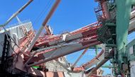 View of the damage after a crane collapsed from a collision with a ship at the port of Kaohsiung, Taiwan June 3, 2021 in this handout image. Taiwan International Ports Corp/Handout via Reuters