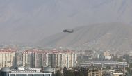 File photo: A NATO helicopter flies over the city of Kabul, Afghanistan June 29. 2020. Reuters/Omar Sobhani/File Photo
 