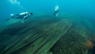Abandoned fishing nets cover a coral reef in a protected area of Ko Losin, where a group of volunteer divers and the Coastal Resources Research Center, helped by the Royal Thai Navy, removed 2,750 sq m of them, Ko Losin, Thailand June 19, 2021. Picture ta