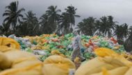 Debris including burned fiberglass and tons of plastic pellets have severely polluted the surrounding waters and a long stretch of the island nation’s famed beaches.