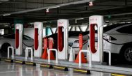 Tesla electric vehicles are charged at a Tesla Supercharger charging station in Hanam, South Korea, July 6, 2020. REUTERS/Kim Hong-Ji/File Photo