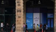 People wait in line outside a coronavirus disease (COVID-19) testing clinic as the city grapples with an outbreak of new cases in Sydney, Australia, June 23, 2021. REUTERS/Loren Elliott