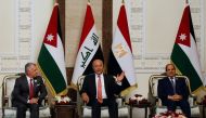Iraqi President Barham Salih meets with King Abdullah II of Jordan and Egypt's President Abdel Fattah al-Sisi, in Baghdad, Iraq, June 27, 2021. REUTERS/Khalid al-Mousily
