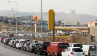 FILE PHOTO: Cars stand in line at a gas station as they wait to fuel up in Damour, Lebanon June 25, 2021. REUTERS/Aziz Taher