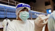 A person receives the Sinovac coronavirus disease (COVID-19) vaccine as the Thai resort island of Phuket rushes to vaccinate its population amid the COVID-19 outbreak ahead of a July 1 end of strict quarantine for overseas visitors to bring back tourism r