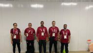 Qatari shooter Muhammad Al Rumaihi (centre), and rower Tala Abujbara pose for a photograph with officials upon their arrival in Tokyo, Japan ahead of the 2020 Olympic Games, yesterday.