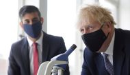 Britain's Prime Minister Boris Johnson and Chancellor of the Exchequer Rishi Sunak take part in a science lesson at King Solomon Academy in Marylebone, London, Britain, April 29, 2021. Dan Kitwood/Pool via REUTERS/File Photo