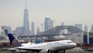 FILE PHOTO: A United Airlines passenger jet takes off with New York City as a backdrop, at Newark Liberty International Airport, New Jersey, U.S. December 6, 2019. REUTERS/Chris Helgren/File Photo
