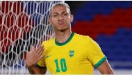 Richarlison of Brazil celebrates scoring their third goal and completing his hat-trick REUTERS/Phil Noble