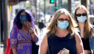 People wearing face protective masks walk on Hollywood Blvd during the outbreak of the coronavirus disease (COVID-19), in Los Angeles, California, U.S. ( REUTERS/Mario Anzuoni/File Photo)