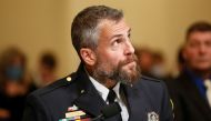 Metropolitan Police Officer Michael Fanone is seated to testify for the opening hearing of the U.S. House (Select) Committee investigating the January 6 attack on the U.S. Capitol, on Capitol Hill in Washington, U.S., July 27, 2021. REUTERS/Jim Bourg/Pool