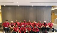 Team Qatar athletes and officials pose for a photograph after arriving in Tokyo from Takasaki, yesterday.