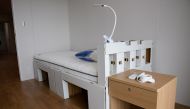 A recyclable cardboard bed and a mattress are pictured in a residential unit for athletes during a media tour at the Olympic and Paralympic Village for the Tokyo 2020 Games, in Tokyo, Japan June 20, 2021. Akio Kon/Pool via REUTERS/File Photo