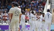 Cricket - First Test - England v India - Trent Bridge, Nottingham, Britain - August 4, 2021 India's Mohammed Siraj celebrates taking the wicket of England's Zak Crawley with teammates Action Images via Reuters/Paul Childs
Cricket - First Test - England v