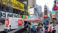 FILE PHOTO: People queue at a popup COVID-19 testing site in Times Square during theoutbreak of the coronavirus disease (COVID-19) in Manhattan, New York City, U.S., August 2, 2021. REUTERS/Andrew Kelly/File Photo
