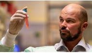 Professor David Nisbet from Australian National University (ANU) holds a vial as researchers from ANU developed a new type of hydrogel that could help to defeat Parkinson's disease, in this undated handout picture. AUSTRALIAN NATIONAL UNIVERSITY/Jamie Kid