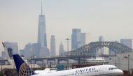 FILE PHOTO: A United Airlines passenger jet takes off with New York City as a backdrop, at Newark Liberty International Airport, New Jersey, U.S. December 6, 2019. REUTERS/Chris Helgren/File Photo

