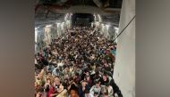 Evacuees crowd the interior of a U.S. Air Force C-17 Globemaster III transport aircraft. Picture taken August 15, 2021. Courtesy of Defense One/Handout via Reuters
