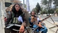 Members of Taliban forces sit at a checkpost in Kabul, Afghanistan August 17, 2021. REUTERS