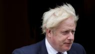 Britain's Prime Minister Boris Johnson walks outside Downing Street in London, Britain, August 18, 2021. REUTERS/Hannah McKay
