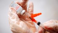 FILE PHOTO: A healthcare worker prepares a syringe with the Moderna COVID-19 Vaccine at a pop-up vaccination site operated by SOMOS Community Care during the COVID-19 pandemic in Manhattan in New York City, New York, U.S., January 29, 2021. REUTERS/Mike S