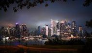 Clouds pass over middle Manhattan and the Empire State Building as Tropical Storm Henri passes through New York City, as seen from Weehawken's Hamilton Park in New Jersey, U.S., August 18, 2021. REUTERS/Eduardo Munoz
